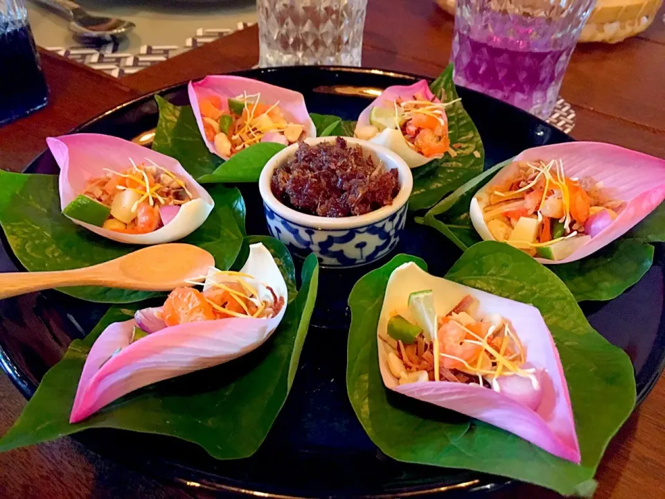 Snapdishの料理写真:Coral tree leaf and lotus petal wrapped|Issara. 🍴さん