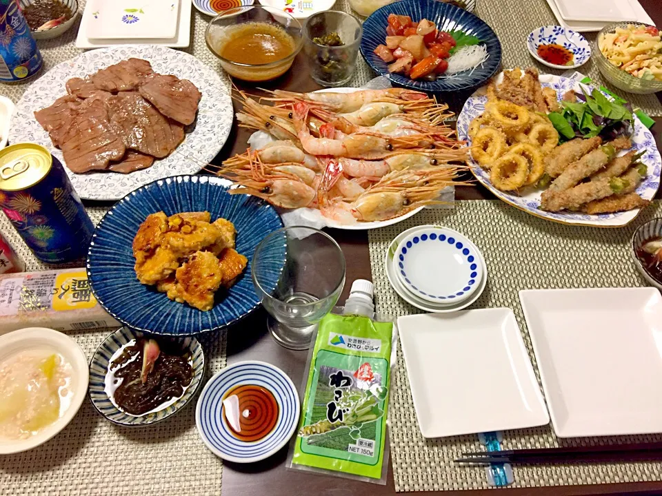 Snapdishの料理写真:牛タン。ボタン海老。鳥挽肉とトウモロコシの照り焼き。いかのリング揚げ。オクラバラ肉巻きフライ。もずく酢。冬瓜。刺身の付け。|りょうさん