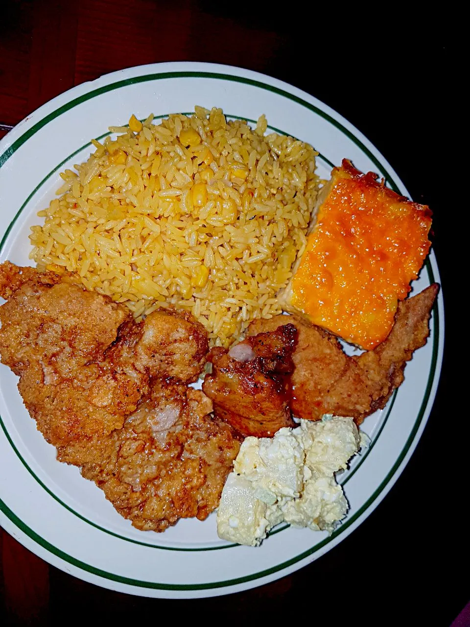 Fried Pork Chops with Fried and Bar B Q Chicken Wings Corn n Rice Baked Mac n Cheese and Potato Salad|Juan Simmsさん