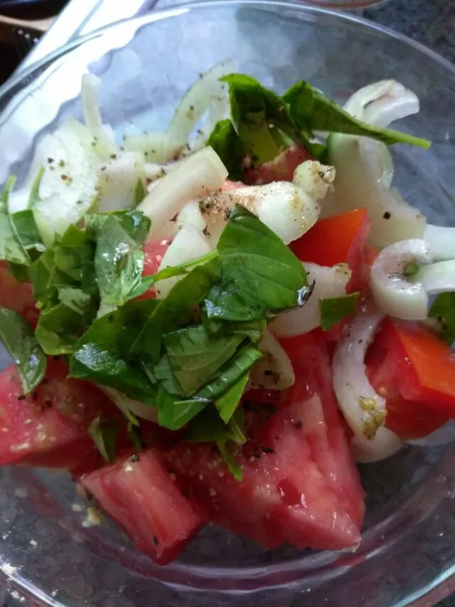 Snapdishの料理写真:native tomato and onion salad with fresh lemon basil|Polly Gelfusoさん