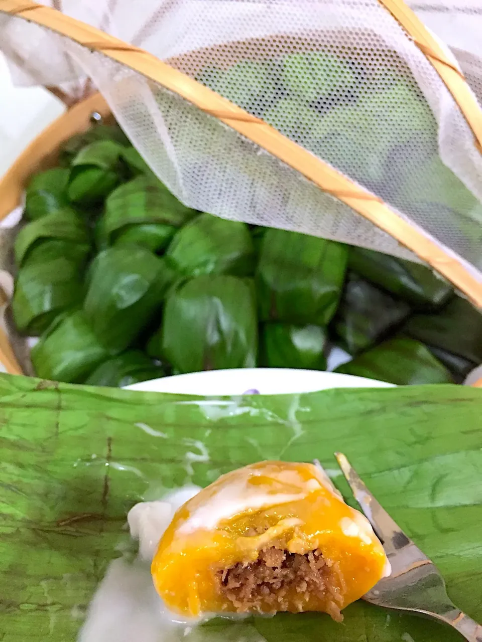 Homemade Koci Labu, made using pumpkin 🎃 and glutinous rice flour, wrapped in Banana leaf.|Amy Aliyyaさん