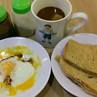 Snapdishの料理写真:Delicious Singapore's local snack Kaya Toast, Half-boiled Eggs and Coffee. Bought at the foodcourt in Singapore.|tracyさん