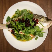 Snapdishの料理写真:Steamed fish with fried black beans, ginger and bird's eye chilli|Anita Chiamさん