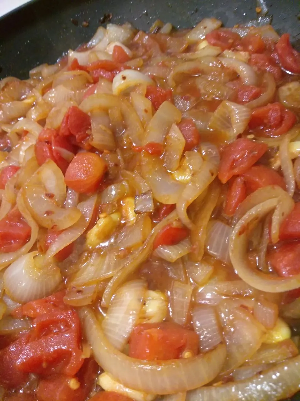 sauteed onions and added tomatoes|Polly Gelfusoさん