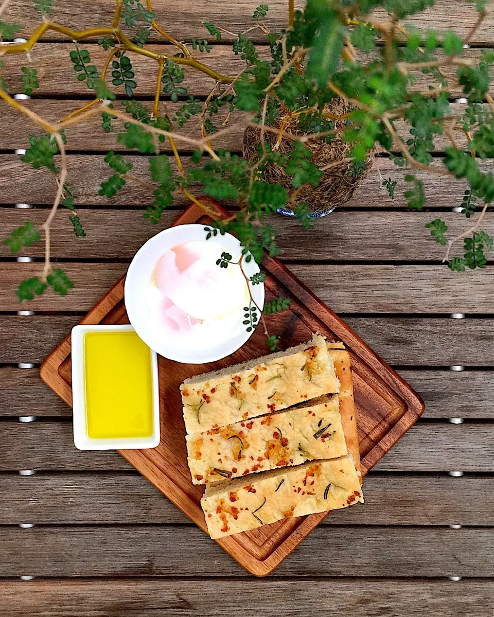 Soft boiled eggs served rosemary garlic focaccia|12Dragonさん