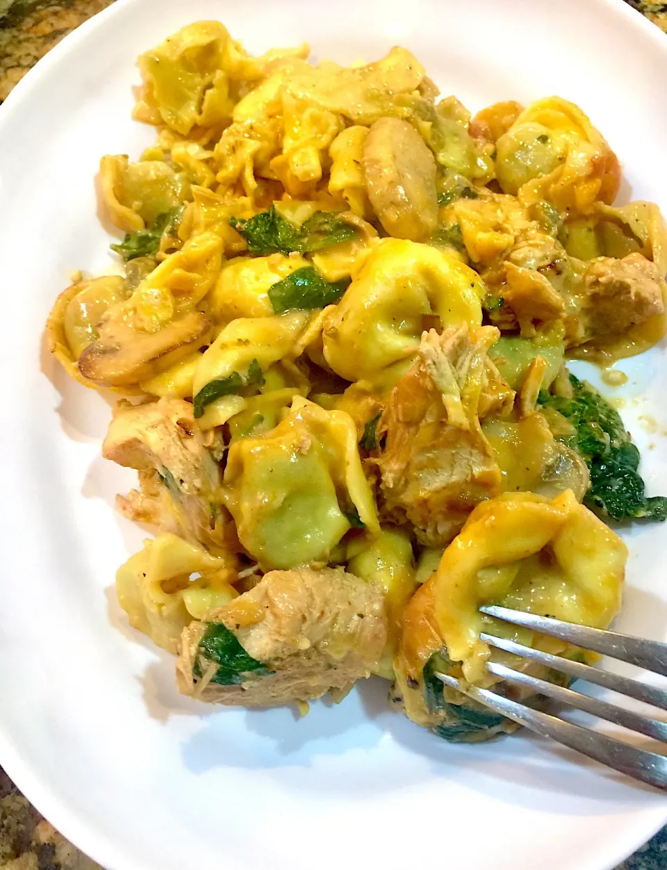 A plate of Creamy Chicken Spinach Tortellini Baked|Alma's Home Kitchenさん