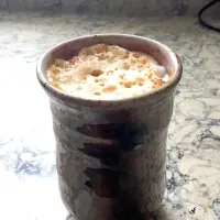 Cappuccino with sprinkled ground cinnamon, cardamom, and cayenne on top.|Debra Mannさん