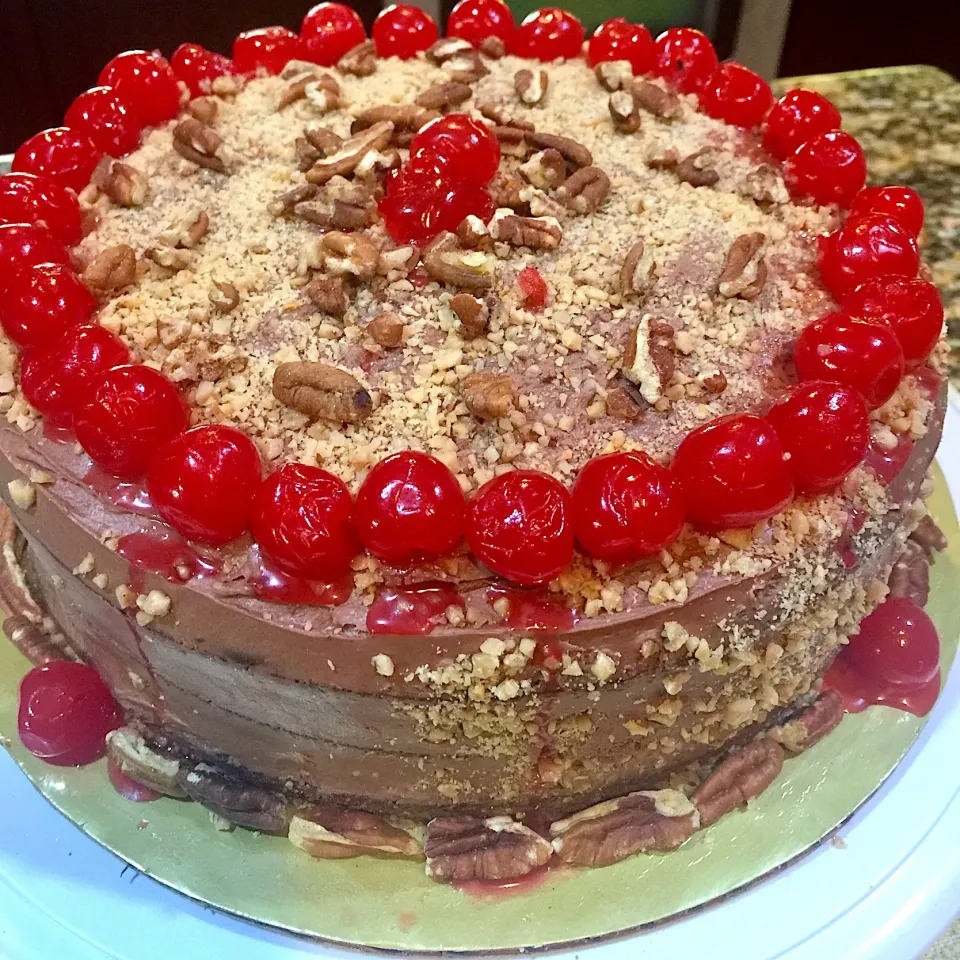 Snapdishの料理写真:Chocolate Fudge Cake 🍰 Topped with Cherries 🍒 and Crusted Pecans|Alma's Home Kitchenさん