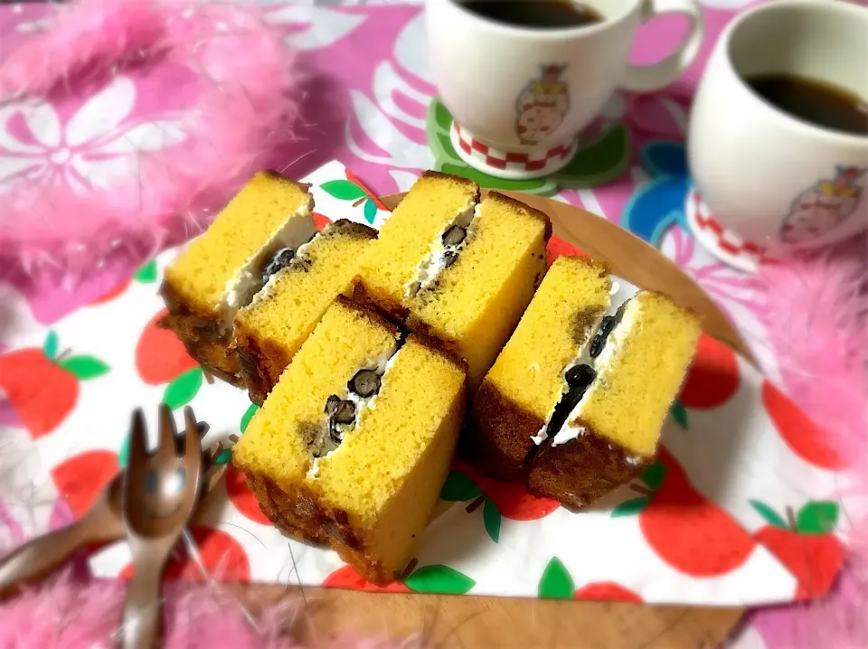 ボンちゃんおめでとう🎉㊗️カステラ黒豆サンドで乾杯🥂|noeさん