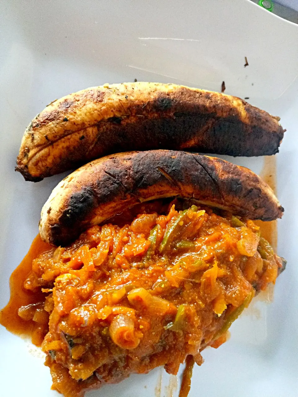 roasted plantain with mackarel in spicy tomato gravy|Jacqueline Godwin Mtuiさん