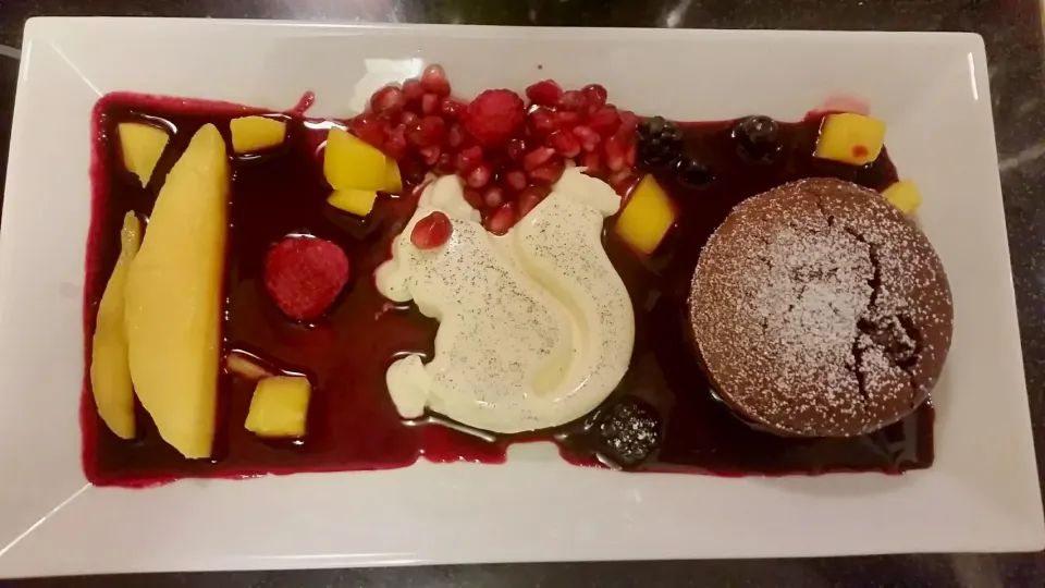 selfmade variation: Panna Cotta, Chocolat Cake with melty core, wild berries sauce, mango and Granat apple
 #Panna Cotta
 #berries
 #Chocolate|Najeskaさん