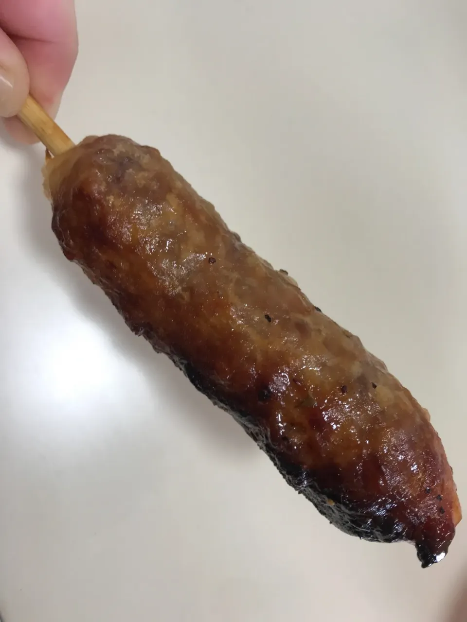 Snapdishの料理写真:桃豚ぶたんぽ(塩味)アツアツのきりたんぽ状柔らかごはんにミンチ豚肉が！

 #大館市 #アメッコ市#屋台#ぶたんぽ|お家でbar!さん