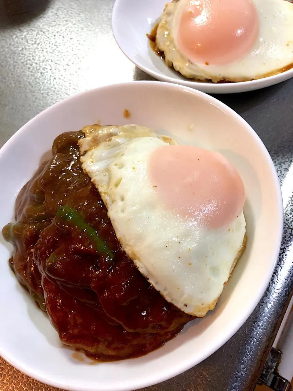 Snapdishの料理写真:煮込みハンバーグ卵乗せ|たびもかさん