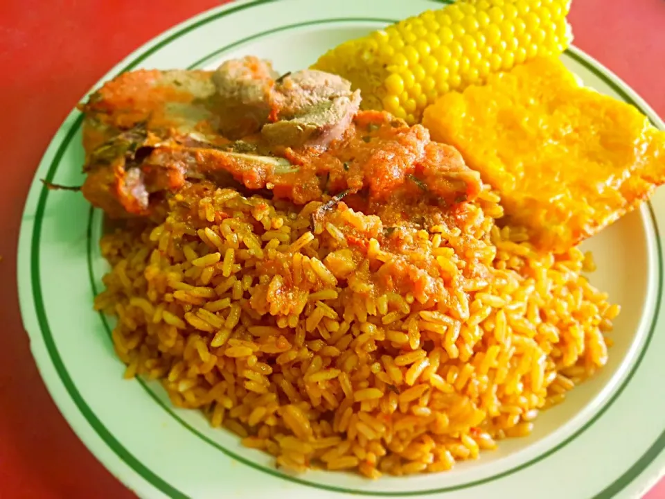 Rosemary Smothered Porkchops with Chickpeas n Rice Roasted Corn on the Cob and Baked Mac n Cheese.|Juan Simmsさん