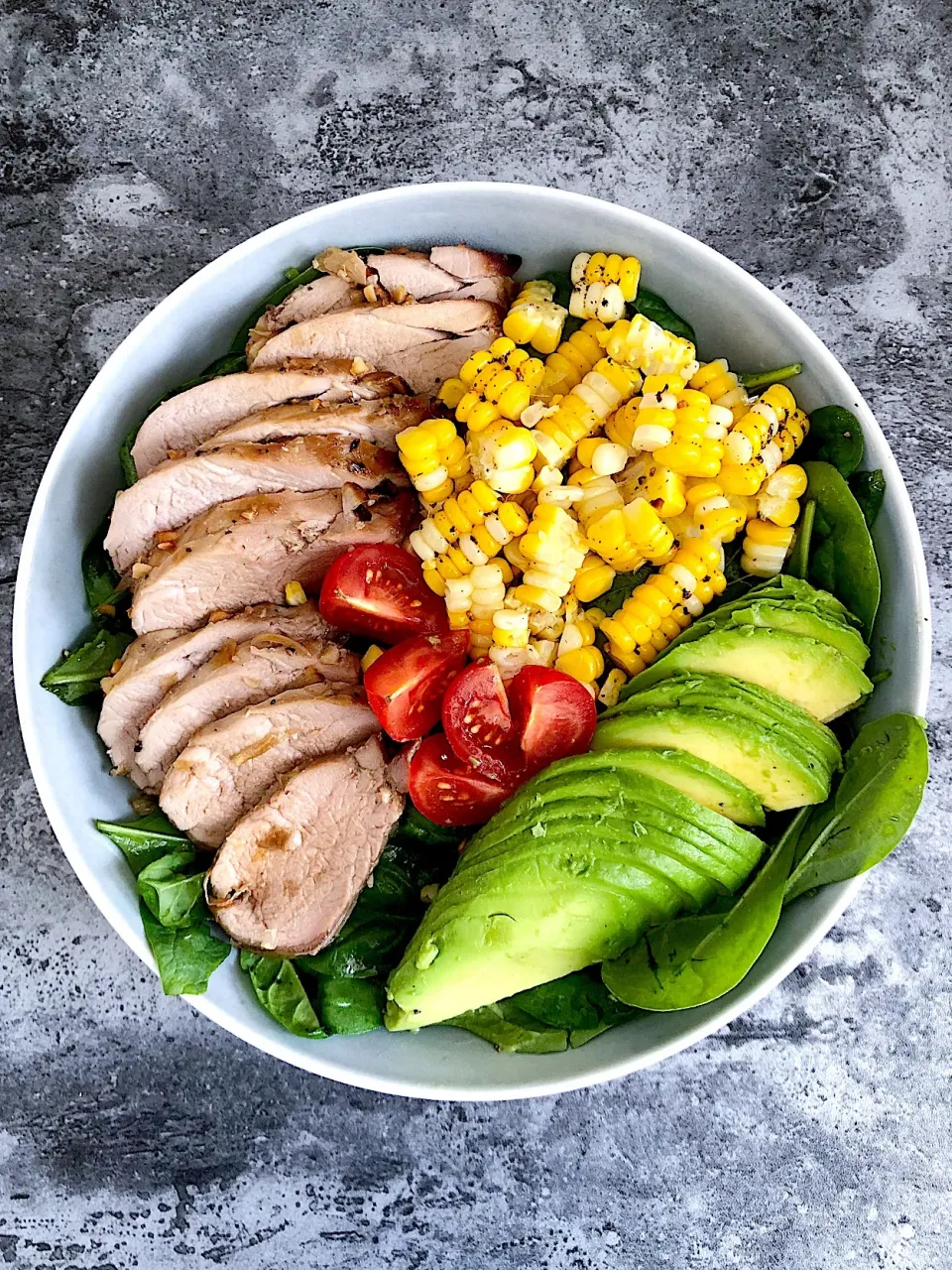 Healthy lunch bowl, roast pork fillet, corn, avocado, baby spinach|12Dragonさん