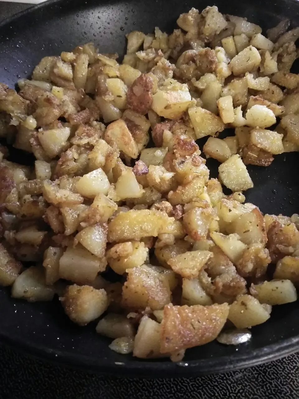 Snapdishの料理写真:sauteed potatoes in olive oil and spices|Polly Gelfusoさん