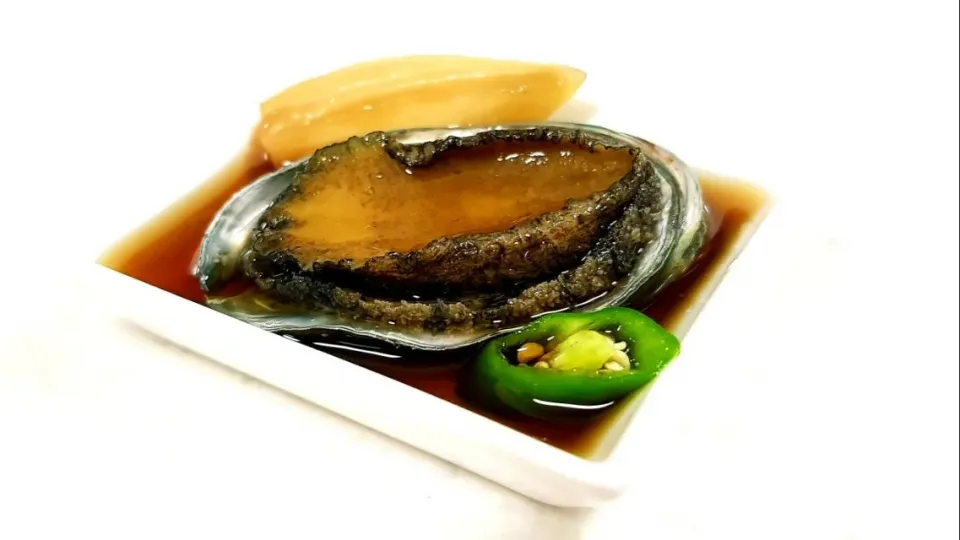 Snapdishの料理写真:abalone in soy sauce marinade|steven z.y.さん