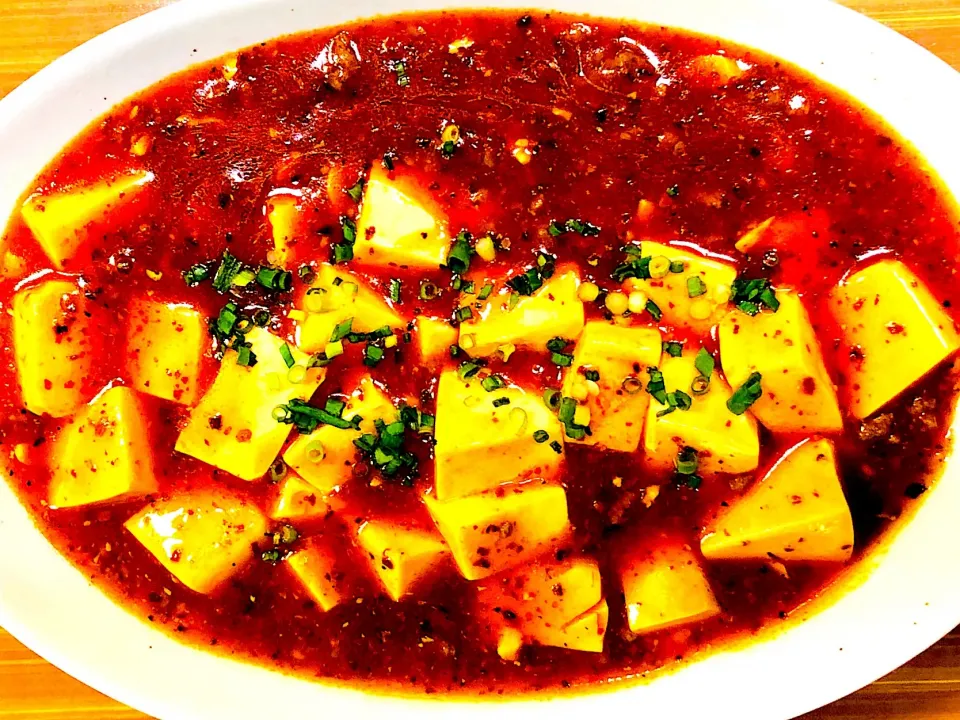 Snapdishの料理写真:自家製辣油の🌶麻婆豆腐✨|肉居酒屋  無限さん