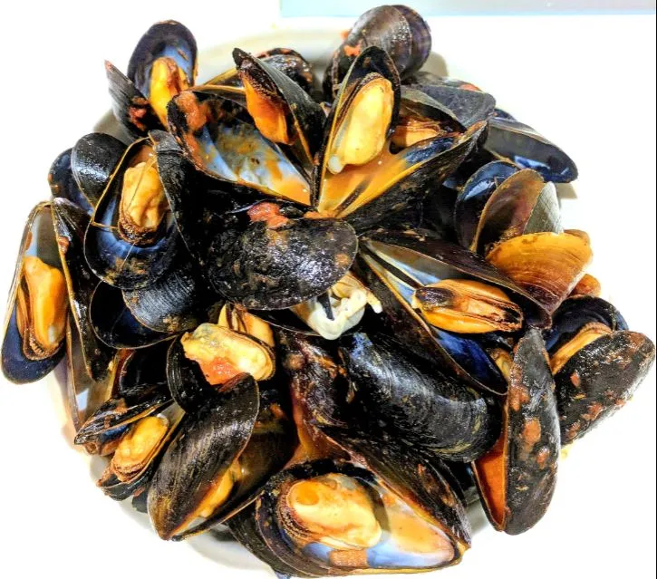 mussels in savory tomato sauce|steven z.y.さん