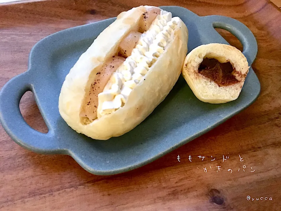 Snapdishの料理写真:佐野未起さんのエンゼルクリームで ももサンド🍑
と かきチョコパン🍊|yucca@さん