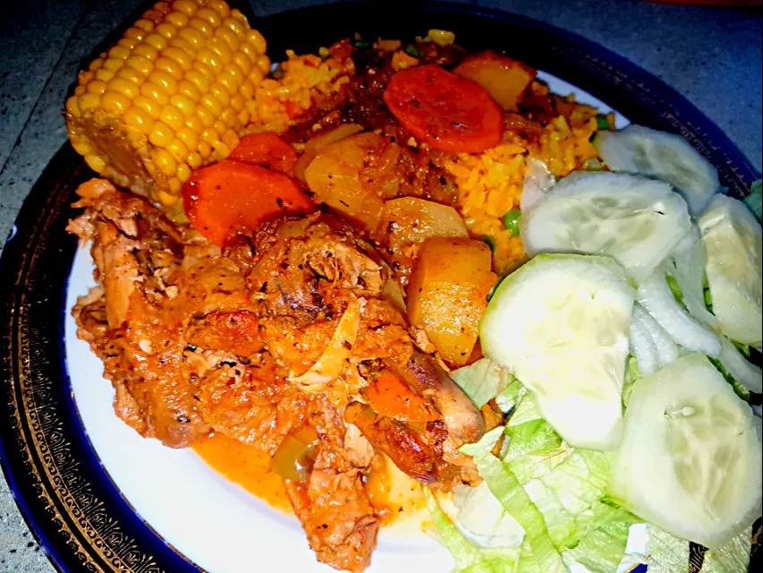 Snapdishの料理写真:Steamed Chicken Wings, Saffron Veggie Rice, Sweet Cinnamon Corn on the Cob and Simple Green Salad.|Juan Simmsさん