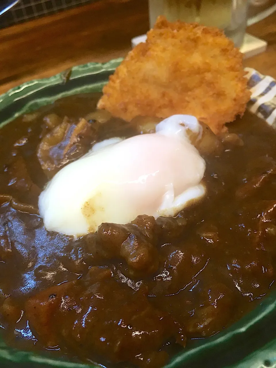 牛すじカレーの上、豚ヘレかつ温玉添^ ^|saturnさん