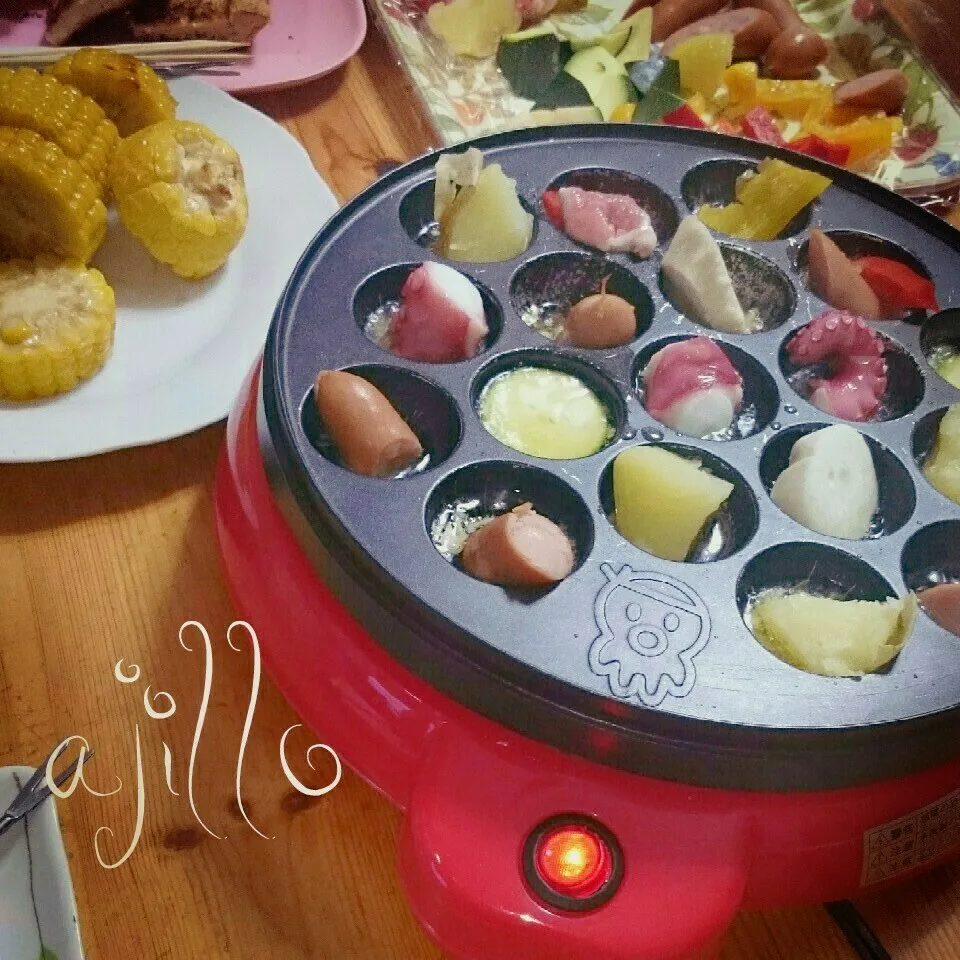 Snapdishの料理写真:たこ焼き器deアヒージョ(^_^;)))|とまと🍅さん