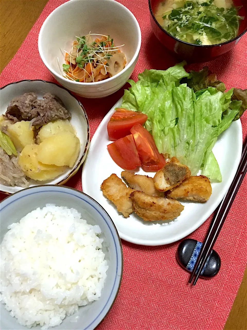 Snapdishの料理写真:鱈の竜田揚げ、塩麹肉じゃが、人参の練りゴマサラダ、豆苗と卵と豆腐のお味噌汁🍚|くっきいママさん