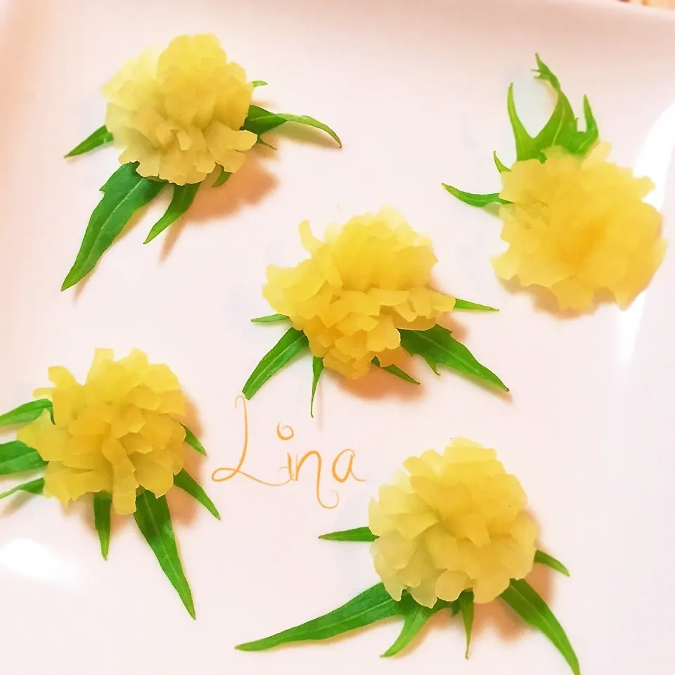 ♡定番♪花飾り♡沢庵タンポポ♡春料理の飾りやお弁当に♪♡|event_cookingさん