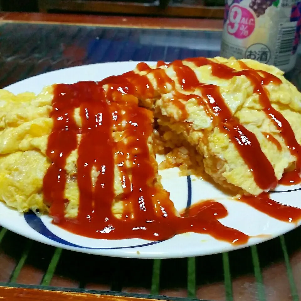 今日夜は、トマトアンチョビライスの入れ過ぎ巨大オムライス♪|dai.noriさん