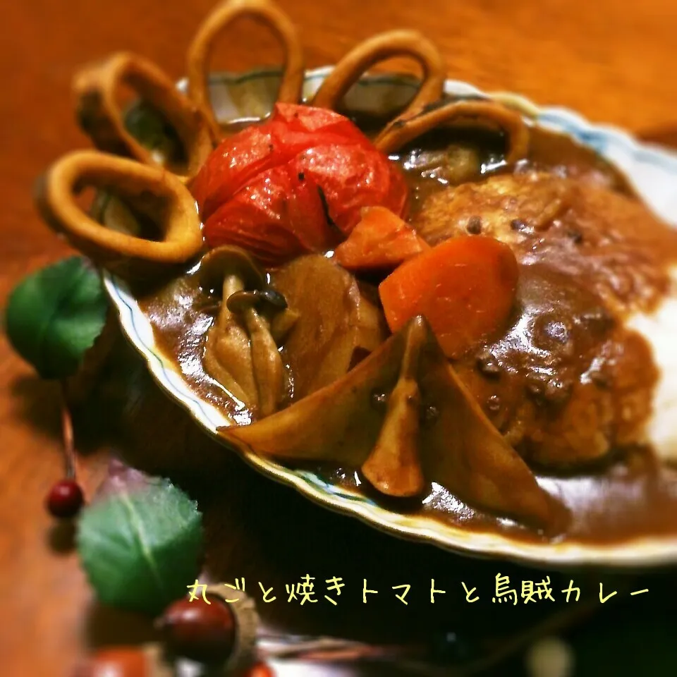 Snapdishの料理写真:丸ごと焼きトマト入り烏賊カレー（*´ω｀*）|おれくっしゃんさん