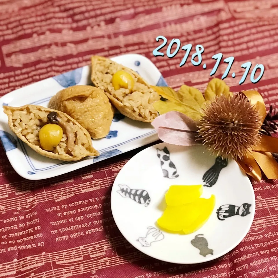 Snapdishの料理写真:栗ご飯のおいなりさん|ビーグルさん