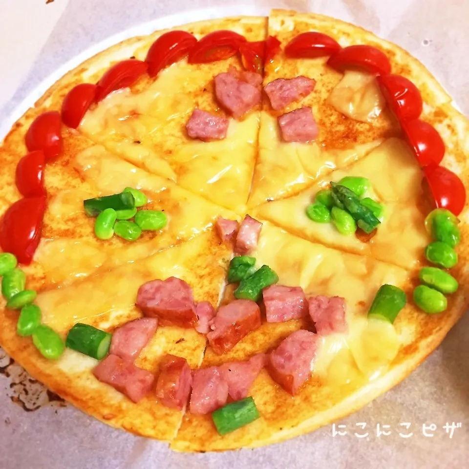 Snapdishの料理写真:＊5歳作。にこにこ(^o^)ピザ…＊|ultramarineさん