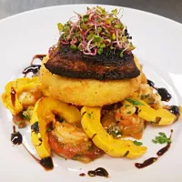 Snapdishの料理写真:blackened mahi, served over shrimp etoufee with delicate squash and a fried pepperjack polenta cake...|chef Charlesさん