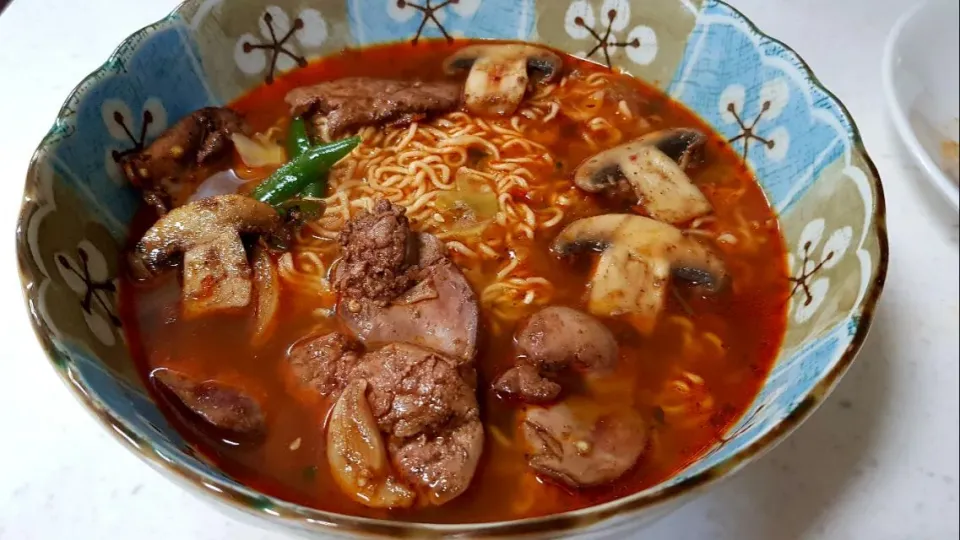 saute chicken liver with spicy noodle soup|steven z.y.さん