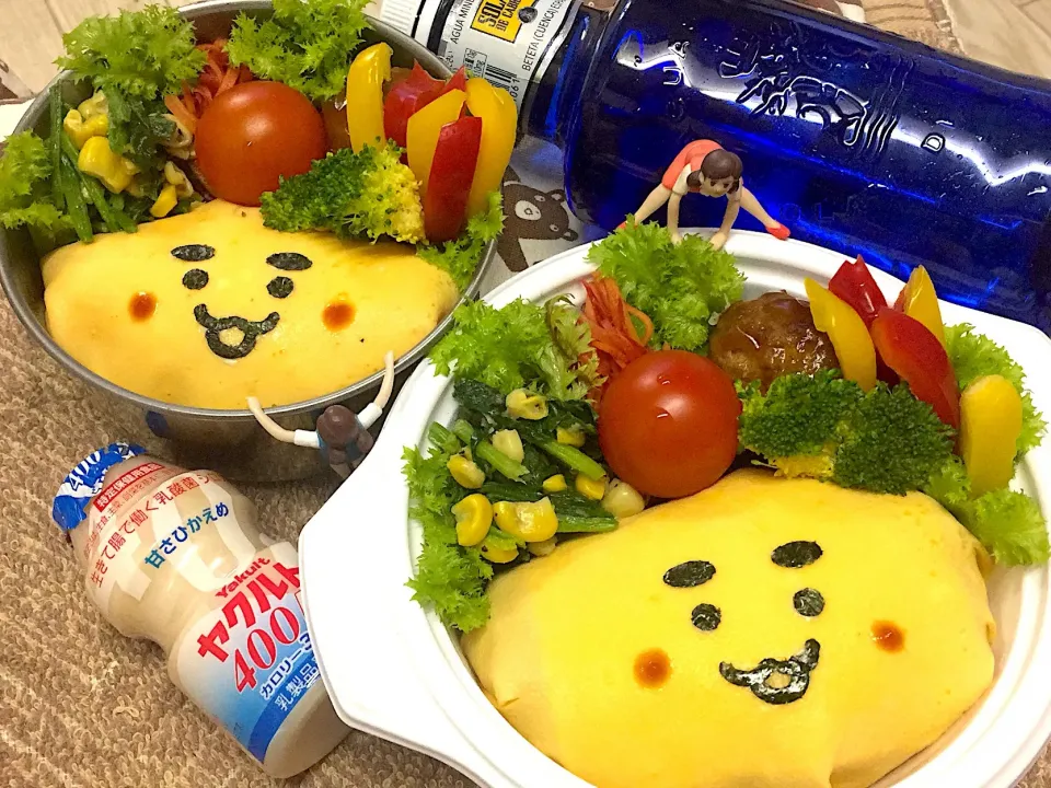 Snapdishの料理写真:オムライス(桃実ver.)&甘酢肉団子&コーン🌽とほうれん草のバターソテー&バイオレットハーモニーのラペ&ブロッコリー🥦&パプリカ&わさび菜&プチトマト🍅の夫婦お弁当♪

 #弁当  #フチ子 #今年ラストお弁当#お疲れ様でした！|桃実さん