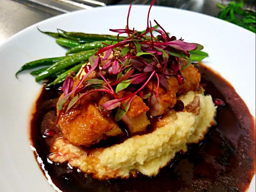 pan seared duck breast ,served over pureed parsnips,topped with duck confit and a pomegranate gastric|chef Charlesさん