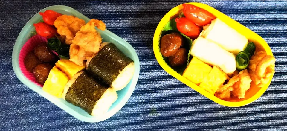 子供達のお弁当【なかよし姉妹弁当】
★タコさんウインナー
★照り焼きミートボール
★卵焼き
★唐揚げ
★おむすび
（長女水色のランチボックス）
★くるくるたまごサンド
（次女イエローのランチボックス）
★お茶（水筒には緑茶を入れて）

保育園のお別れ遠足でした。|I am hungry familyさん