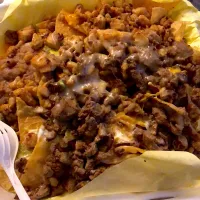 Snapdishの料理写真:Nachos supreme chicken and Carne Asada|Leensey Benavidesさん