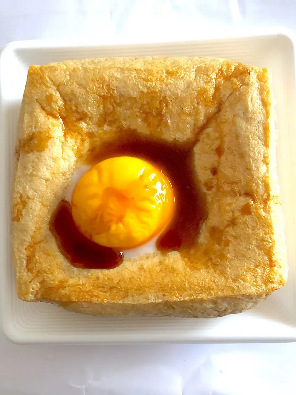 Snapdishの料理写真:ざぶとん揚げの黄身のせ焼き〜🥚|Syonaさん