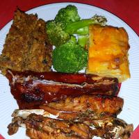 Baked Turkey Wings Half Rack Barbecued Ribs Baked Macaroni and Cheese with Steamed Broccoli and Kabassa Stuffing.