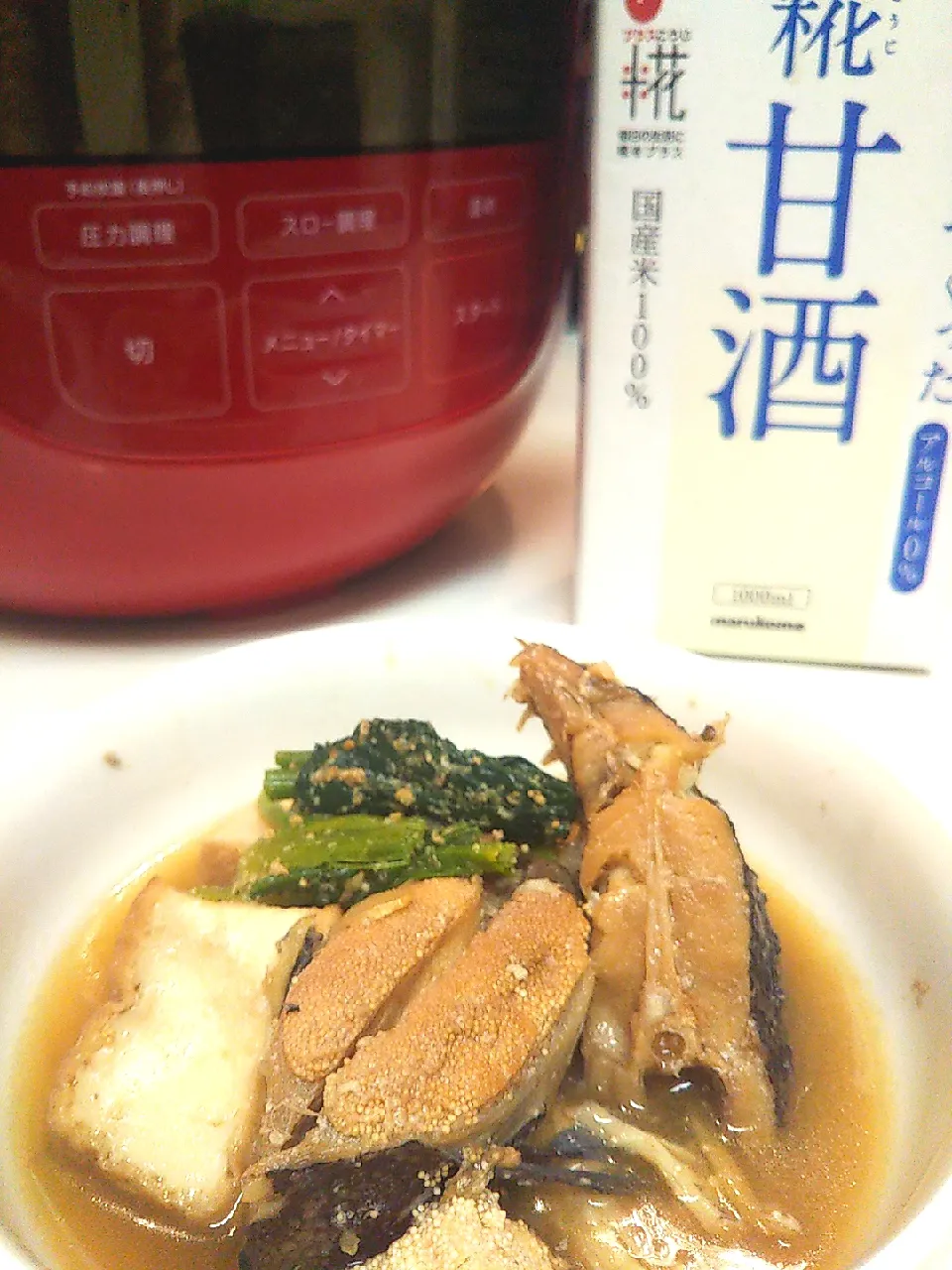 Snapdishの料理写真:子持ちカレイと厚揚げの甘酒煮|まきごろうさん