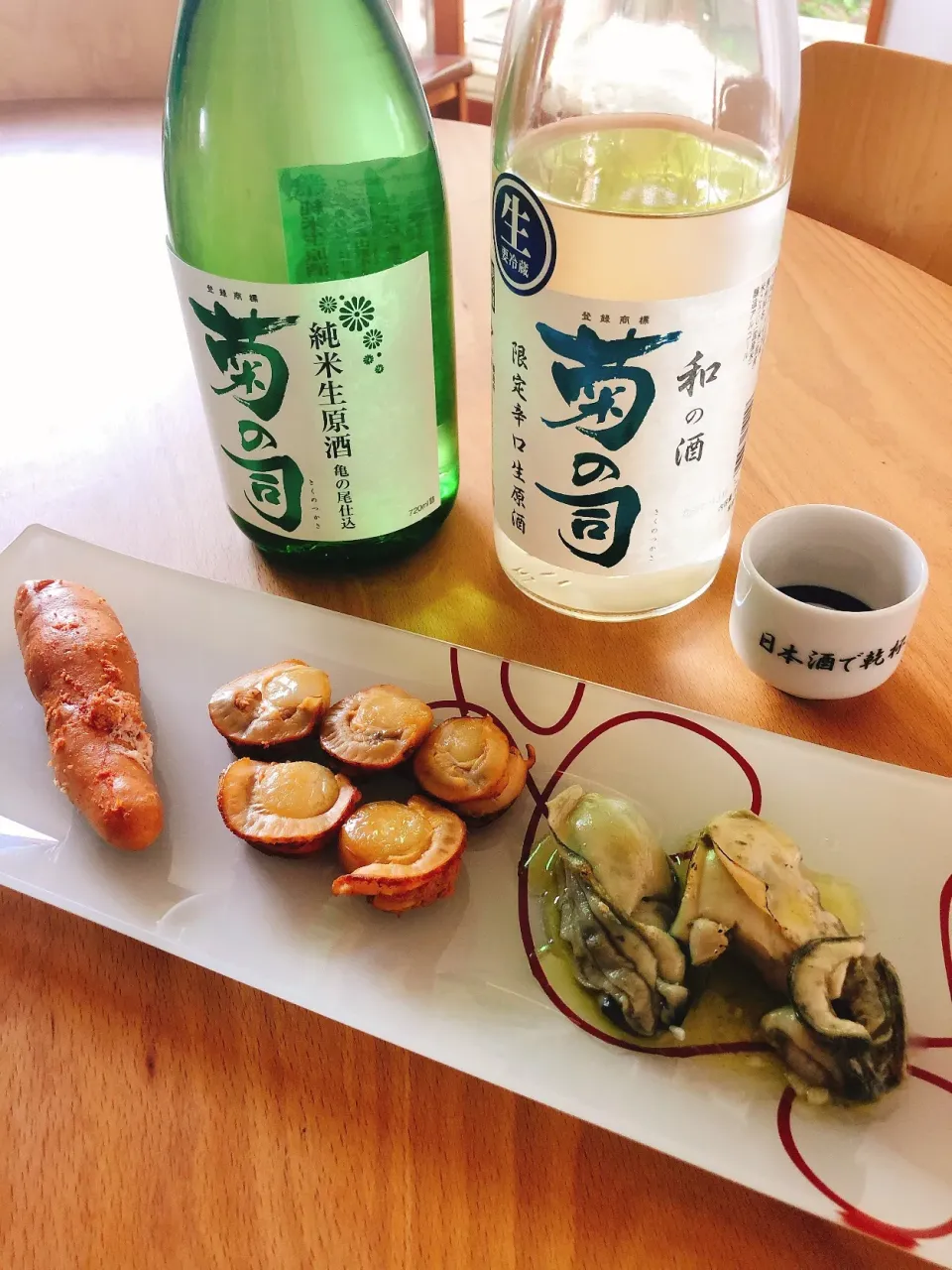 休日酒の肴、牡蠣のコンフィ、燻製盛り合わせ(明太子とホタテ)  #家飲み|角康広さん