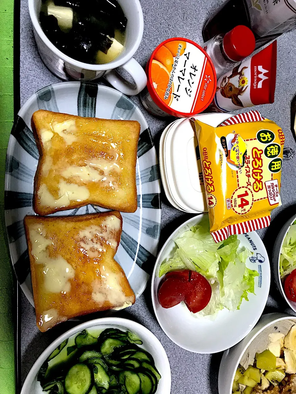 Snapdishの料理写真:最後はチーズにマーマレード塗って食べた #混ぜ食い  #朝食  #昼飯 食パン(トースト)、味噌汁、キュウリ浅漬け、スライスチーズ、マーマレード、練乳、レタストマトサラダ|ms903さん