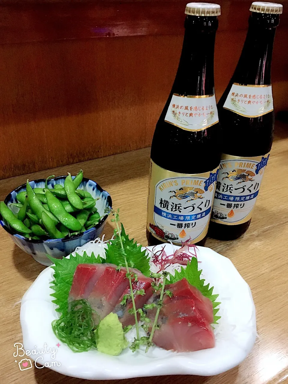 Snapdishの料理写真:カンパチ刺身
枝豆
と瓶ビール🍺|さちさん