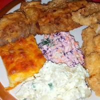 Fried Snapper with Cracked Chicken Baked Macaroni and Cheese with Potato Salad and Coleslaw