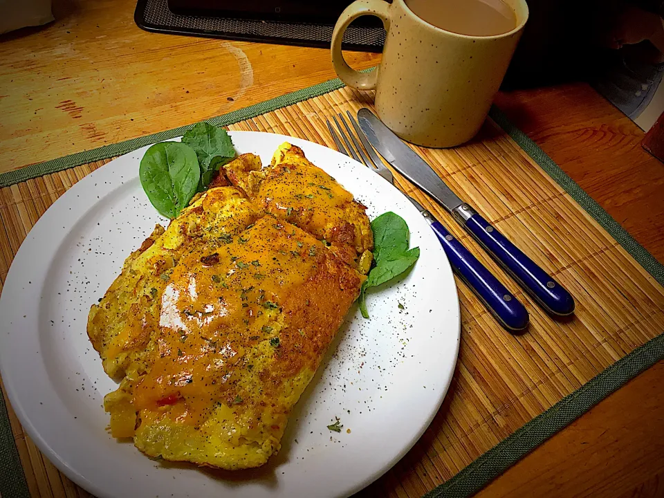 Snapdishの料理写真:Omelette With Yellow Vidalia Onions, Yellow Peppers, Garlic, Parmesan and Cheddar Cheese, Black Pepper|Michaels Culinary Adventuresさん