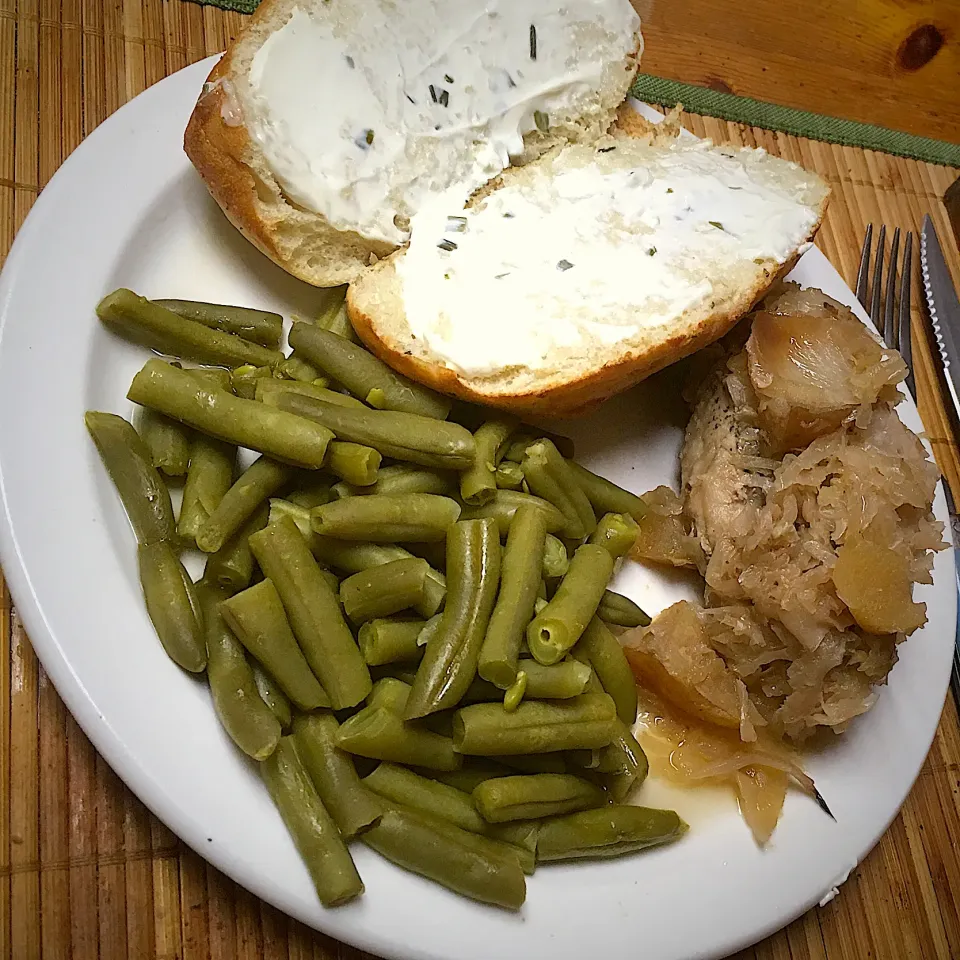 Snapdishの料理写真:Baked Pork Loin Marinated in Brown Sugar, Apples, and Sour Kraut served with Green Beans and Rosemary Baked Roll and Onion & Chive Cream Cheese|Michaels Culinary Adventuresさん