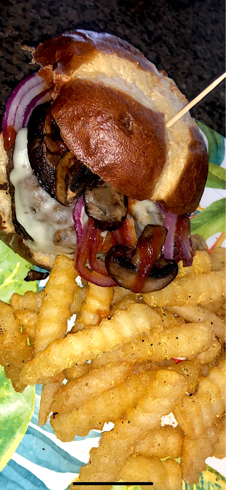 Pretzel bun Quarter pounder topped with onions portobello mushrooms and Sriracha sauce|Tawanjaさん