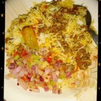 Snapdishの料理写真:Mince Biryani (Spicy Mince Rice) with Salad.|wajiha a sabirさん